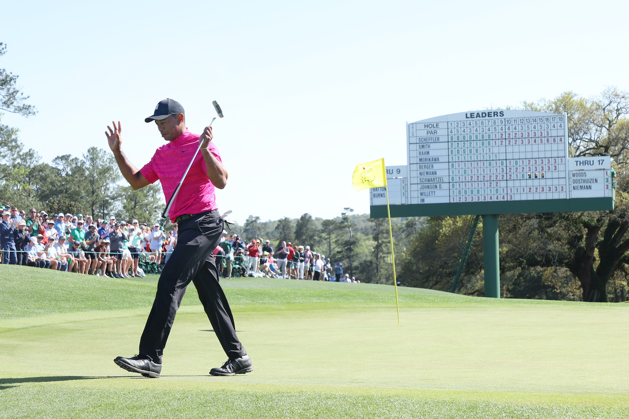 Tiger Woods waves to the crowd.