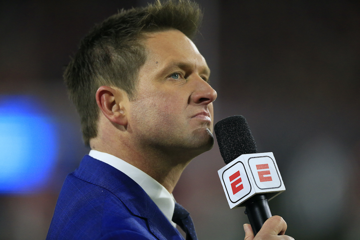 Todd McShay looks on during a college football game.