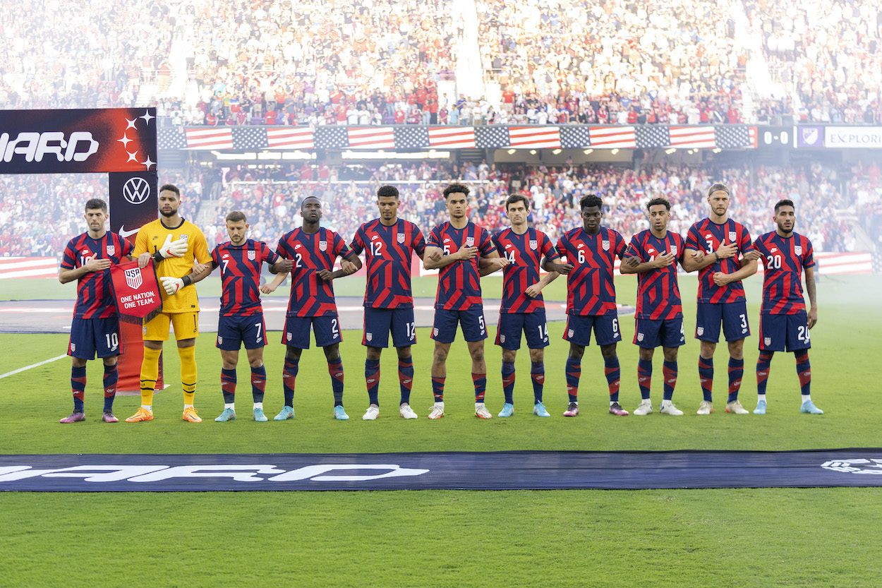 The USMNT stands for the national anthem during a FIFA World Cup qualifier. The 2022 World Cup draw put the USMNT in Group B.