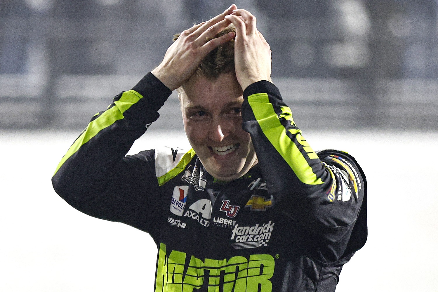 William Byron reacts after winning the NASCAR Cup Series Blue-Emu Maximum Pain Relief 400 at Martinsville Speedway on April 9, 2022, in Martinsville, Virginia.