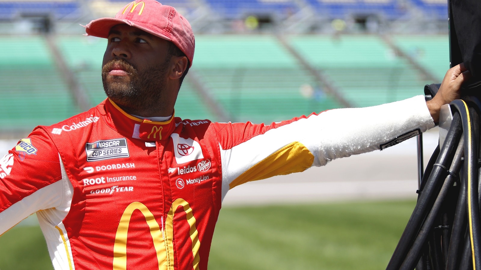 Bubba Wallace waits on the grid during qualifying for the NASCAR Camping World Truck Series Heart of America 200 at Kansas Speedway on May 14, 2022, in Kansas City, Kansas. | Sean Gardner/Getty Images