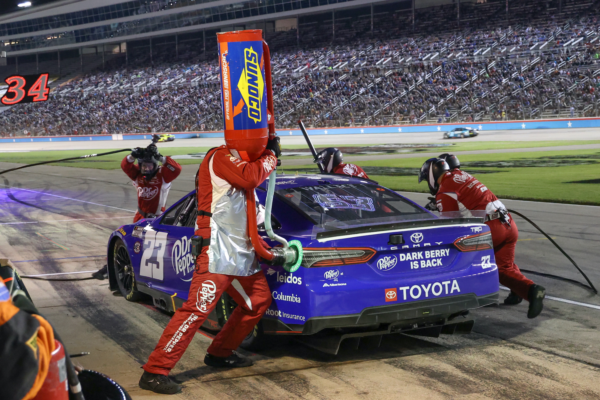 Bubba Wallace makes pit stop