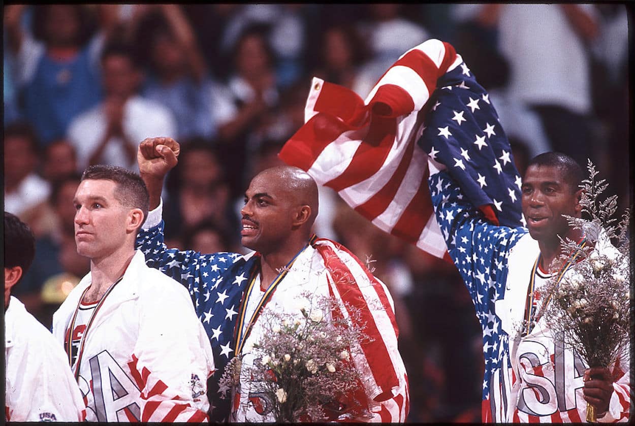 Charles Barkley (C) takes the podium as a member of the Dream Team