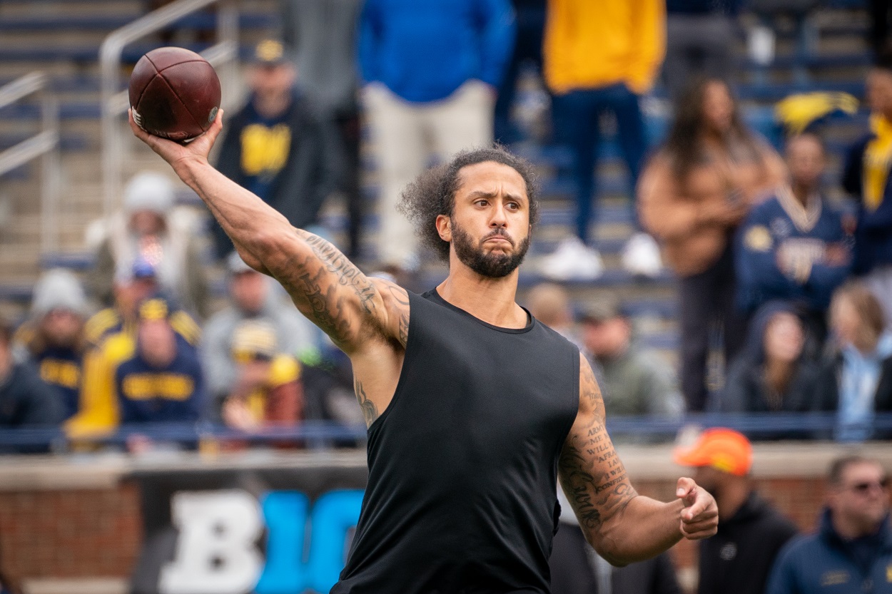 Colin Kaepernick works out during Michigan's spring game