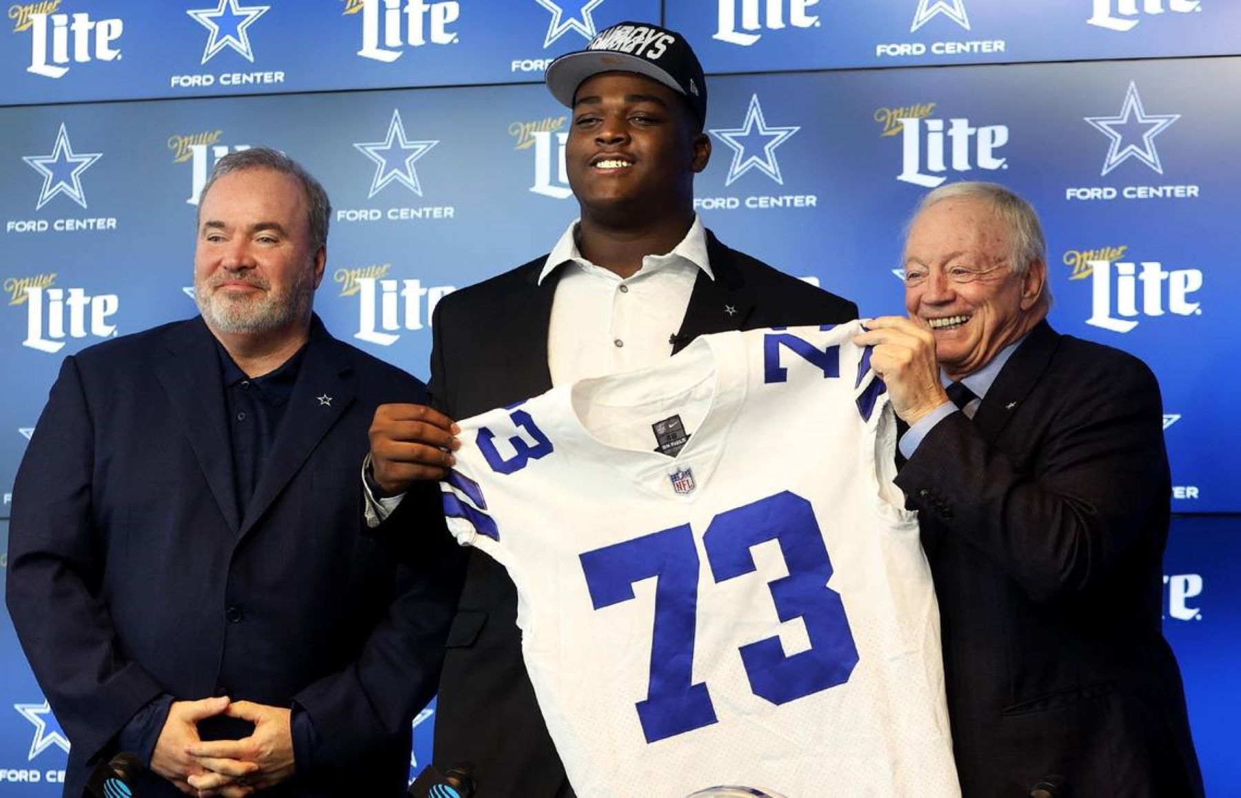 Dallas Cowboys draft pick Tyler Smith with coach Mike McCarthy and owner Jerry Jones