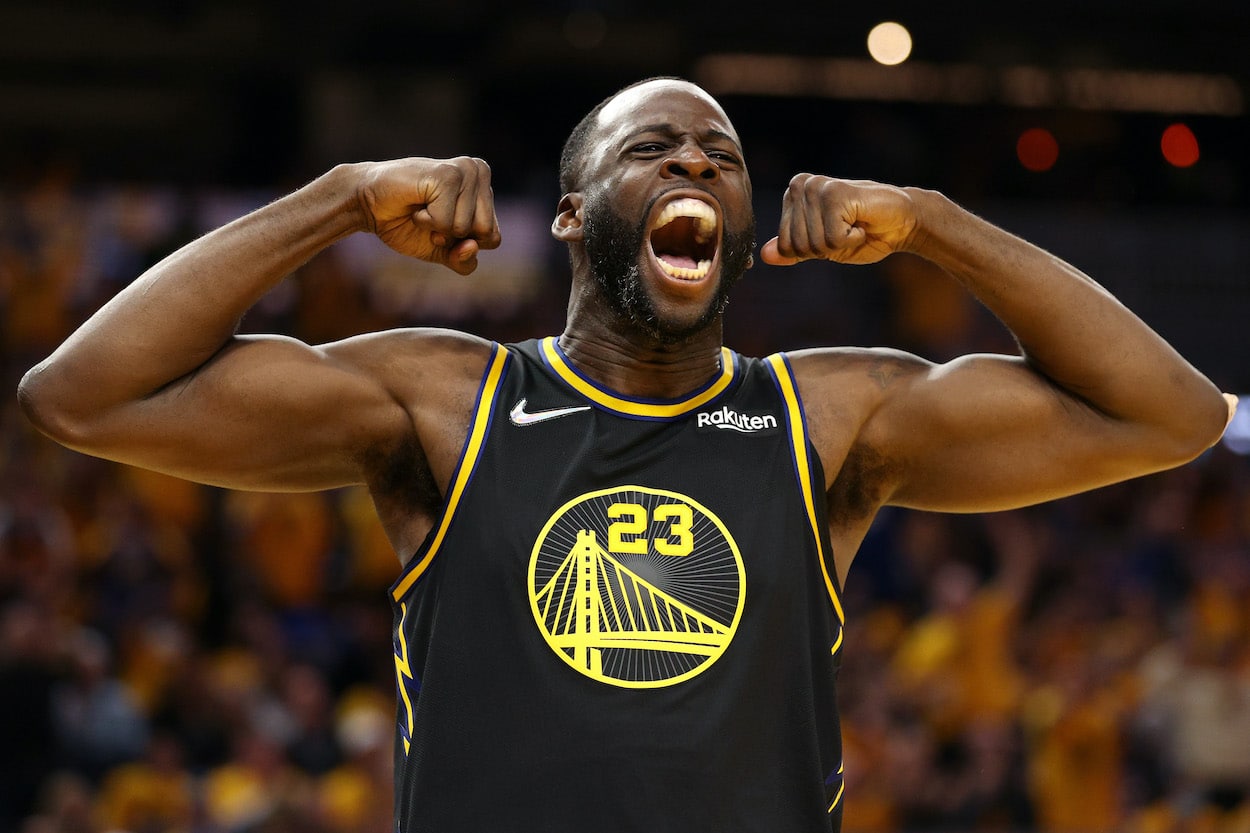 Draymond Green reacts against the Mavericks.