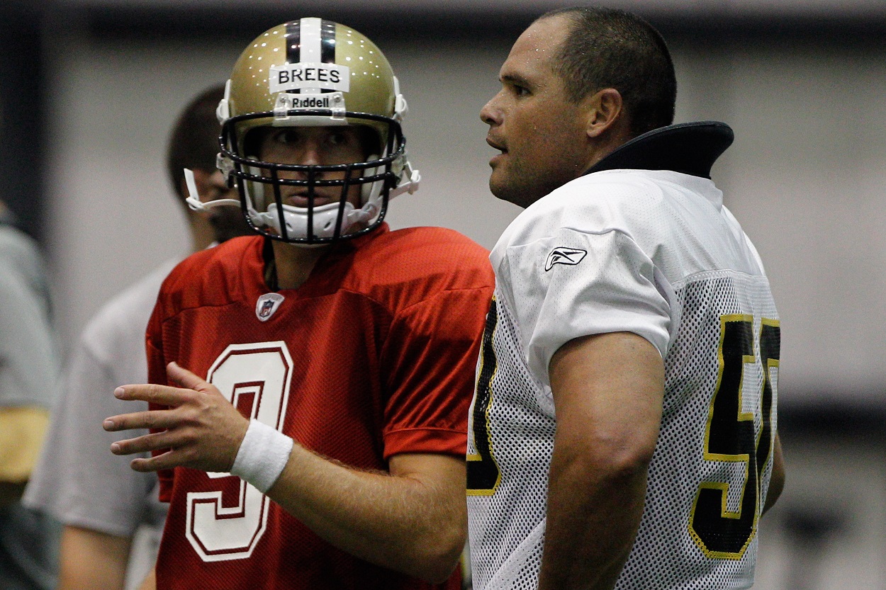 Drew Brees and Olin Kreutz during New Orleans Saints training camp in 2011