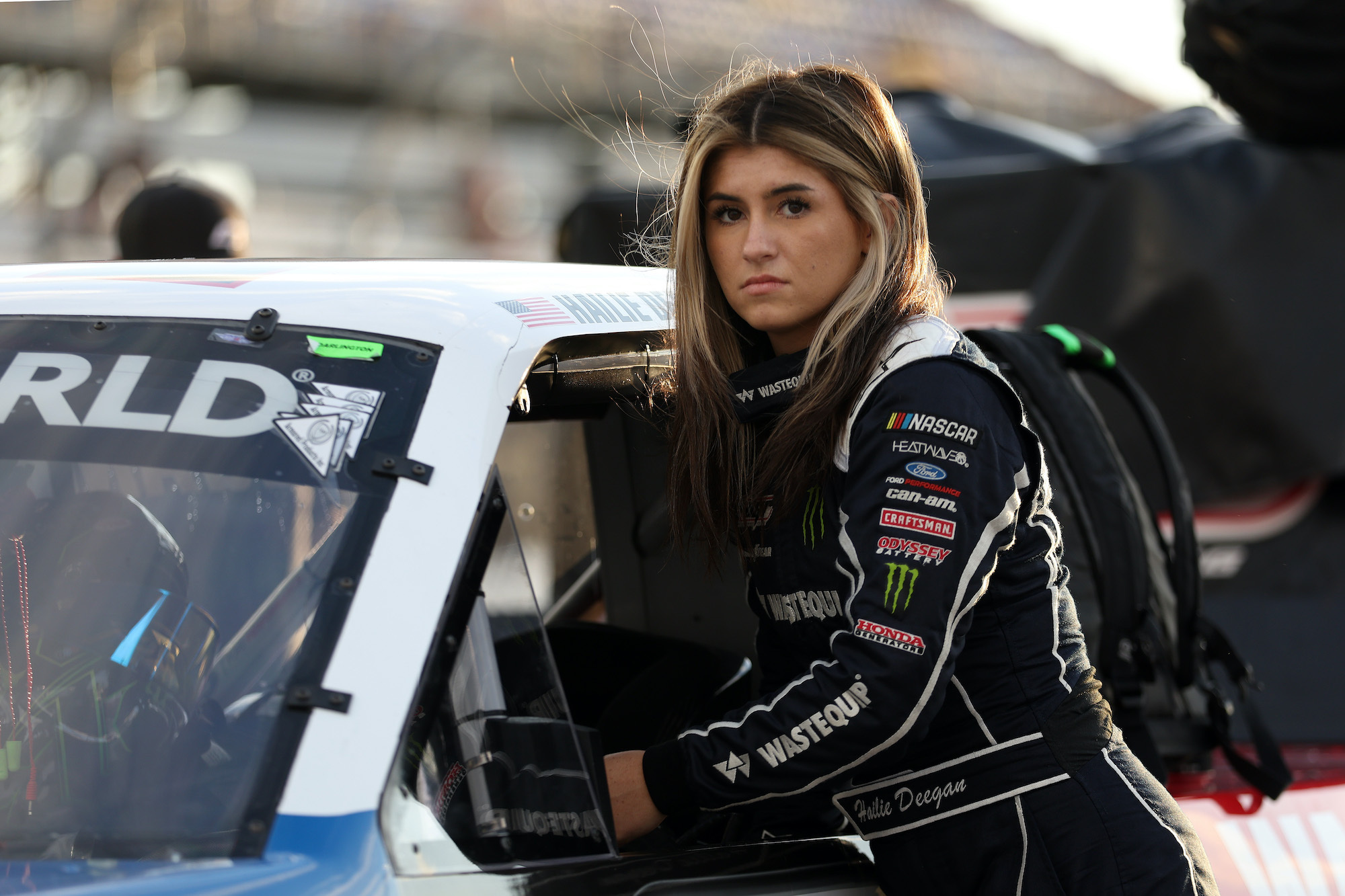 Hailie Deegan stands on pit road before race