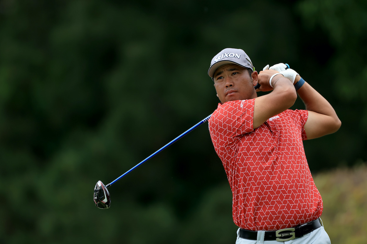 Hideki Matsuyama hits a shot during a practice round.