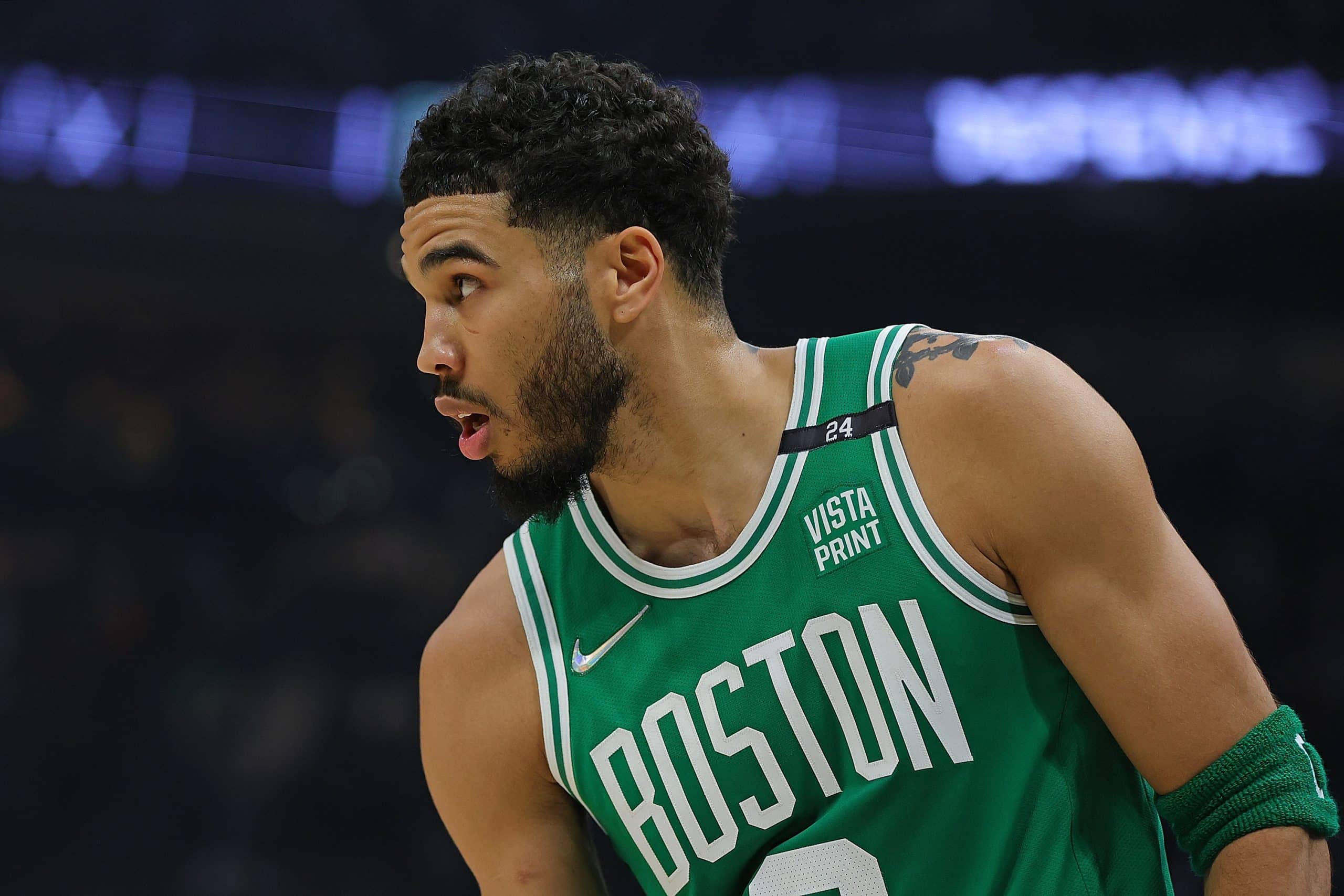 Jayson Tatum of the Boston Celtics watches action against the Milwaukee Bucks.