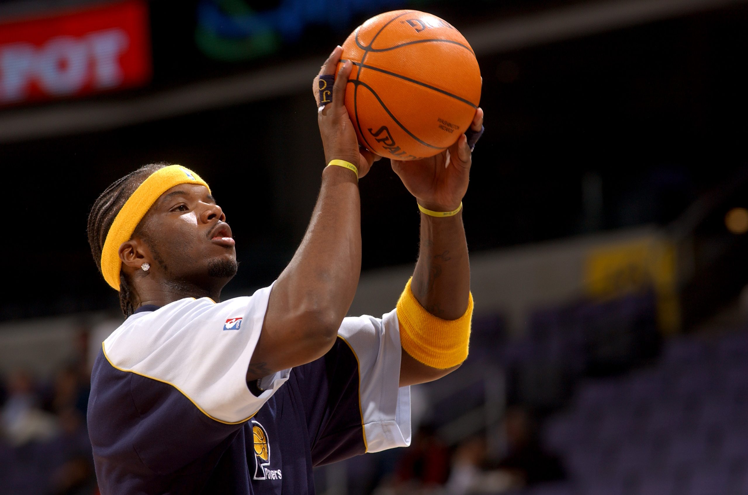 Jermaine O'Neal of the Indiana Pacers warms up before the game against the Washington Wizards on January 4, 2003.