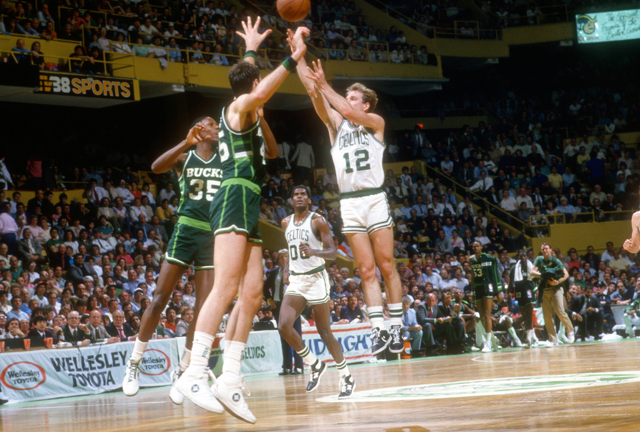 Jerry Sichting of the Boston Celtics shoots against the Milwaukee Bucks during an NBA basketball game circa 1986 at the Boston Garden in Boston, Massachusetts.