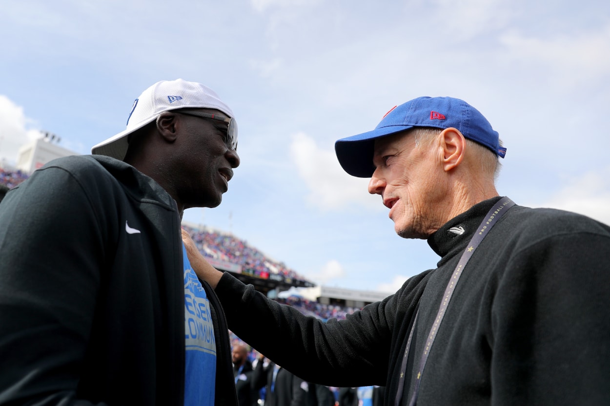 Former defensive end Bruce Smith, left, and former quarterback Jim Kelly talk.