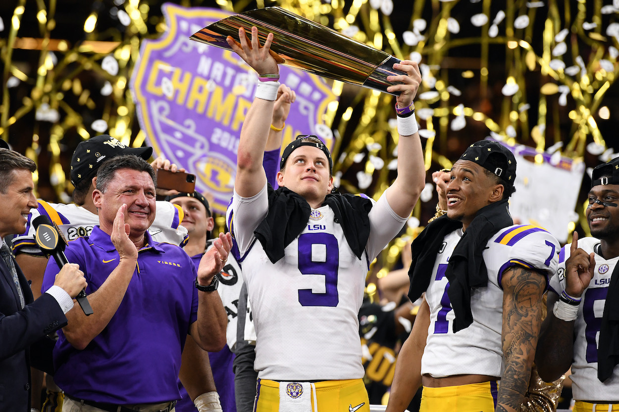 Joe Burrow lifts the trophy after leading LSU to a national championship.