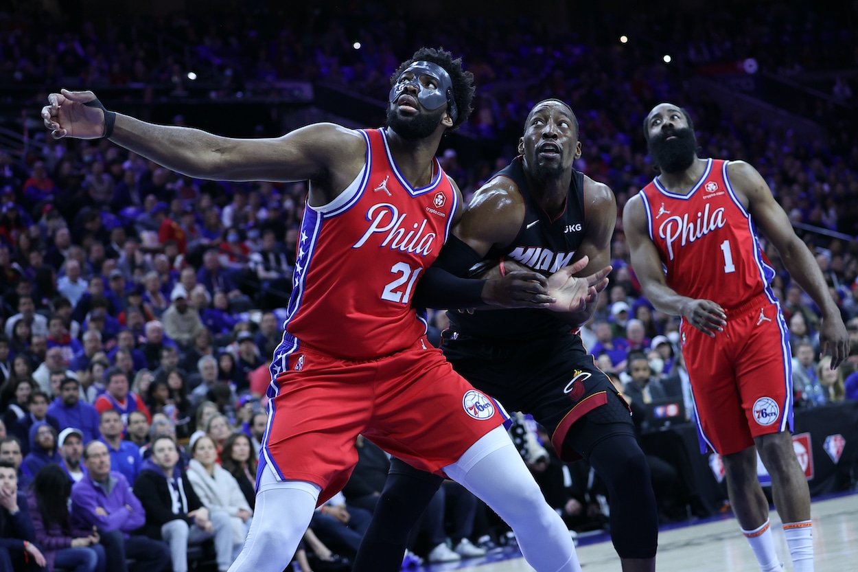 Joel Embiid battles Bam Adebayo down low.