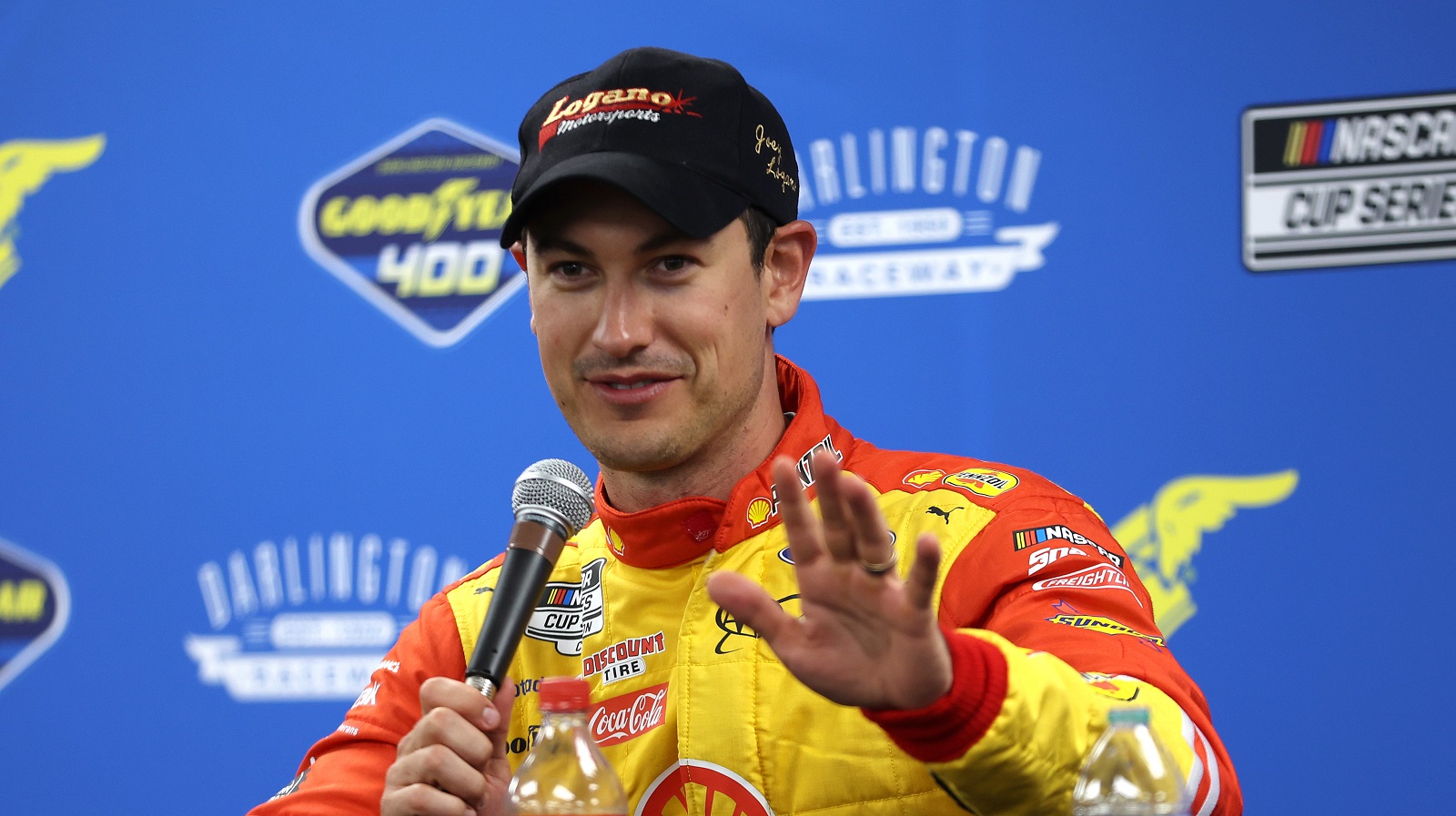 Joey Logano speaks to the media after winning the NASCAR Cup Series Goodyear 400 at Darlington Raceway on May 8, 2022. | James Gilbert/Getty Images