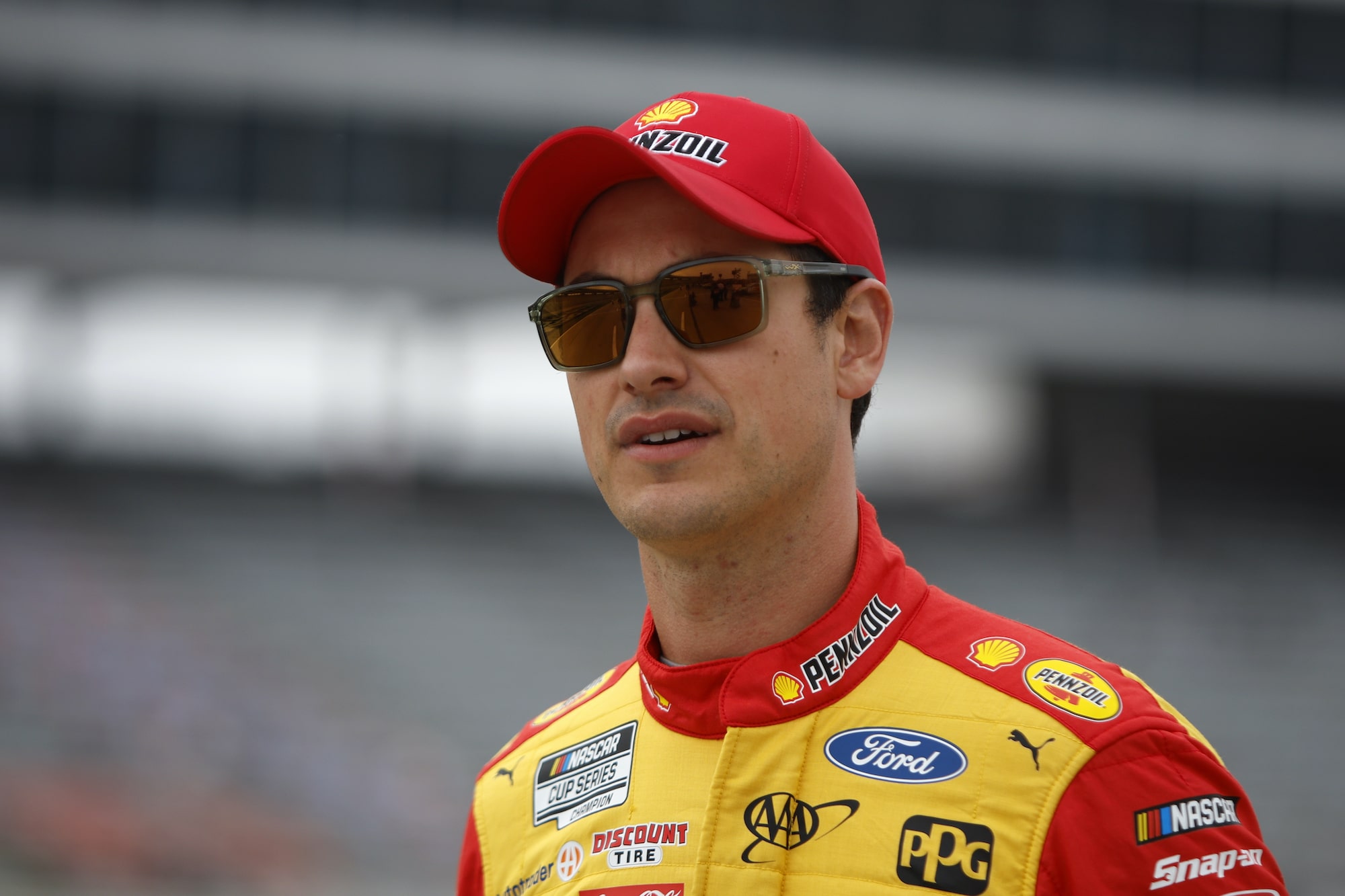 Joey Logano walks grid