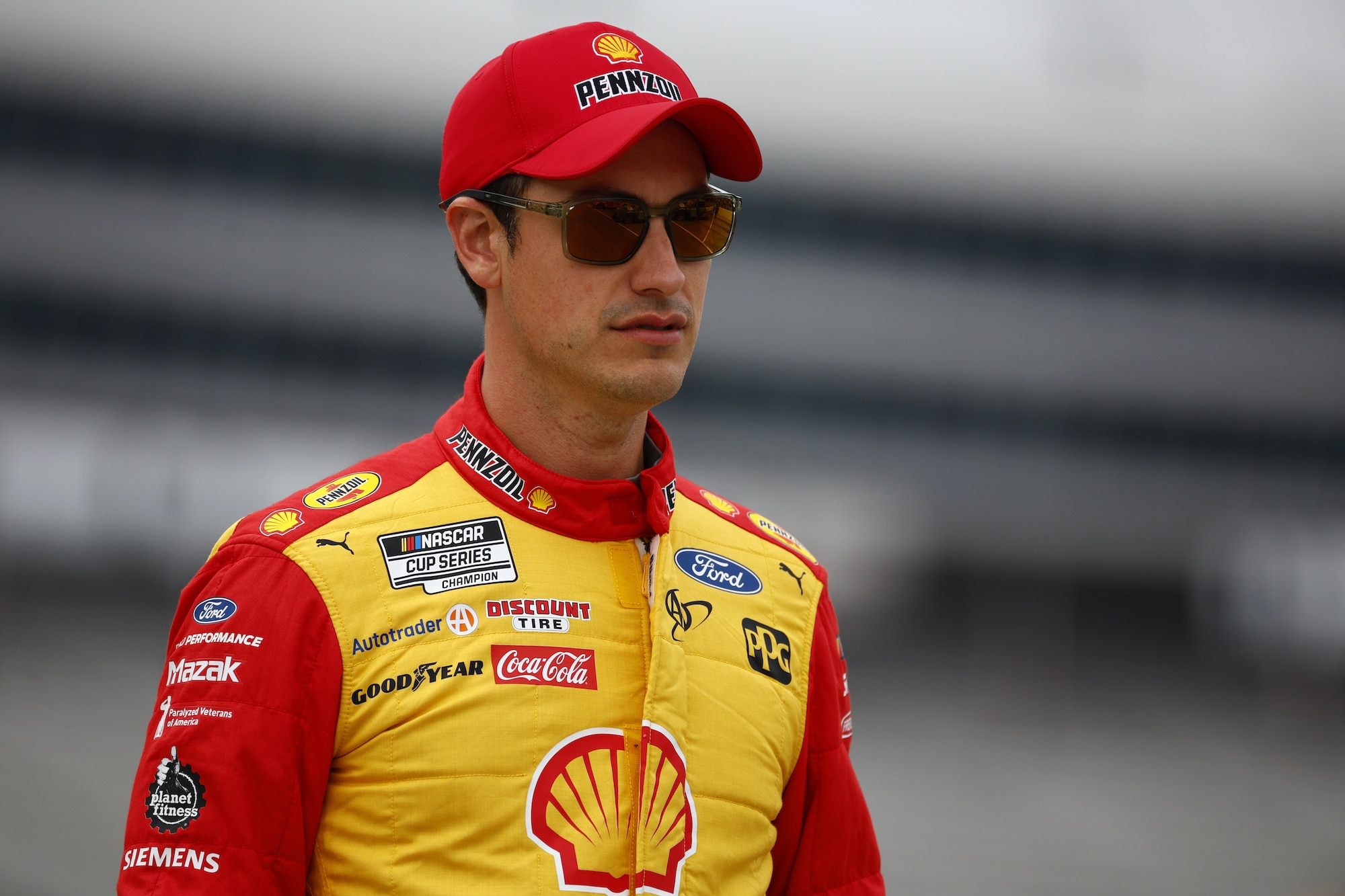 Joey Logano walks grid