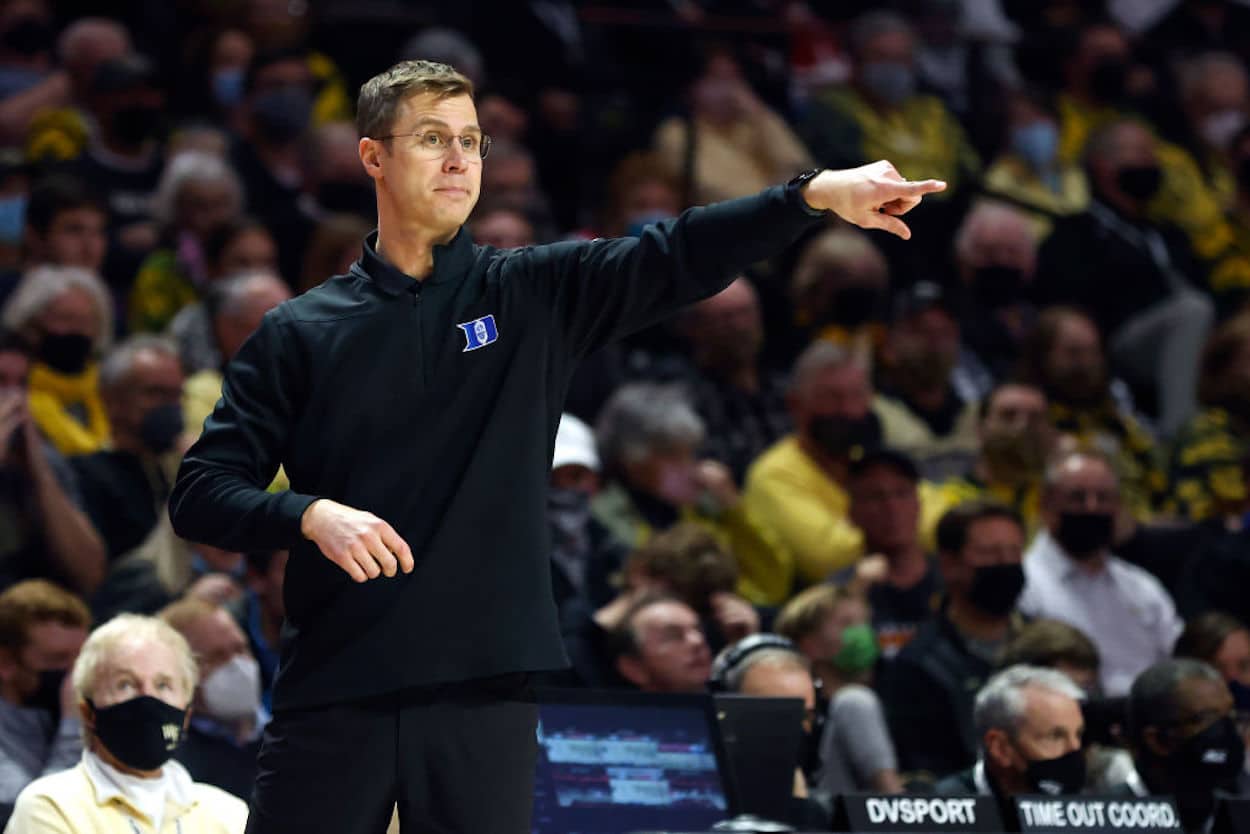 Jon Scheyer gestures on the Duke Blue Devils sidelines.