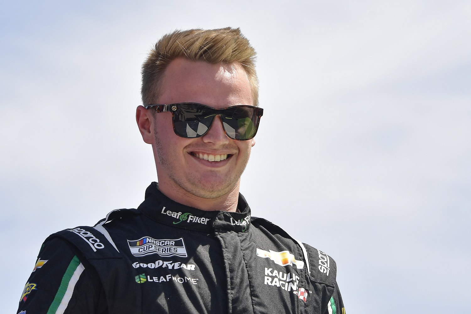 Justin Haley walks onstage during driver intros prior to the NASCAR Cup Series Echopark Automotive Grand Prix at Circuit of The Americas on March 27, 2022. | Logan Riely/Getty Images