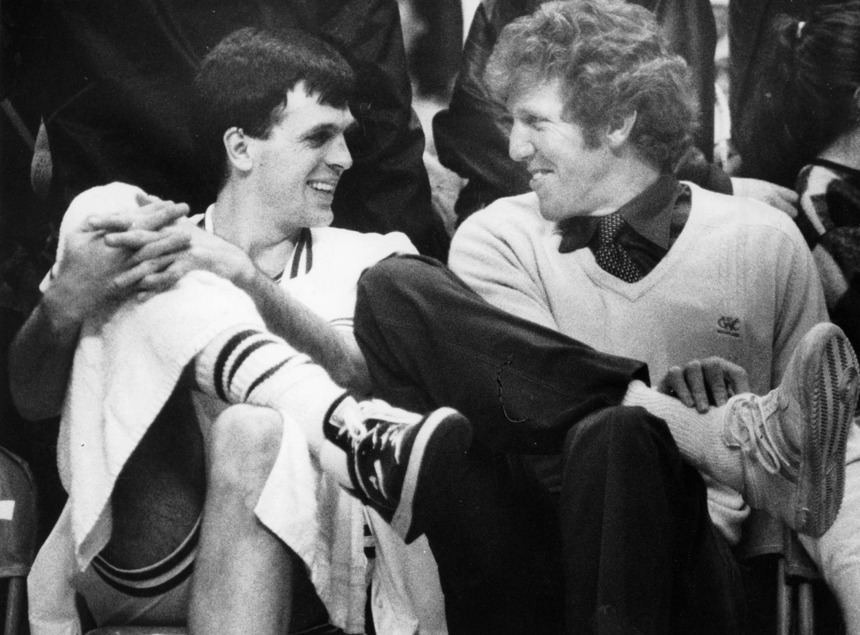 Kevin McHale, left, and Bill Walton share a laugh on the Boston Celtics bench.