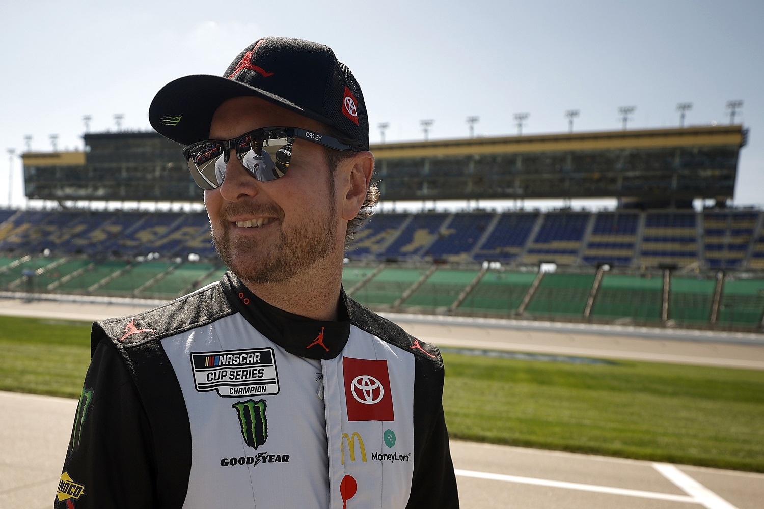 Kurt Busch, driver of the No, 45 Toyota, walks the grid during practice for the NASCAR Cup Series AdventHealth 400 at Kansas Speedway on May 14, 2022.