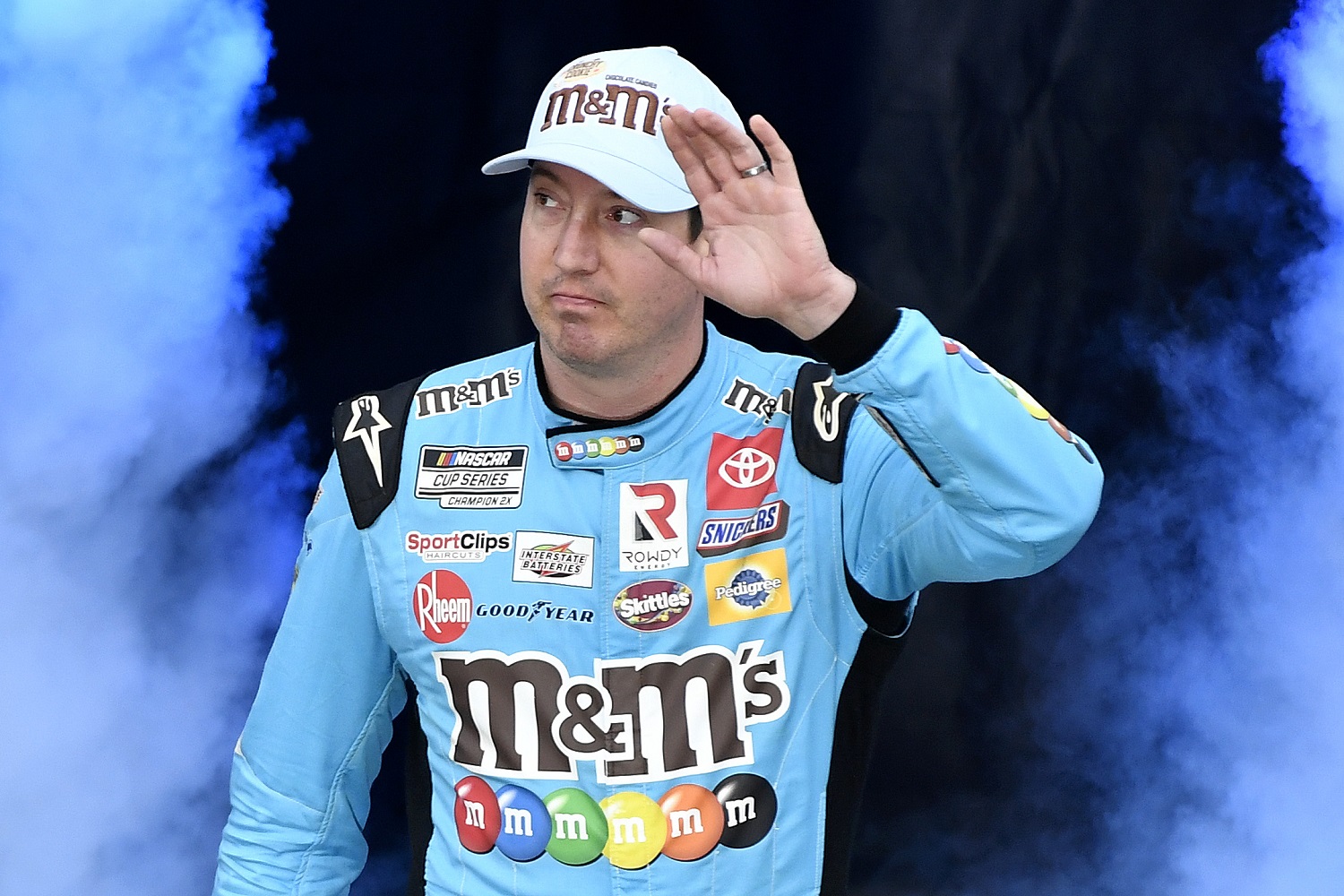 Kyle Busch waves to fans during driver intros prior to the NASCAR Cup Series Food City Dirt Race at Bristol Motor Speedway on April 17, 2022. | Logan Riely/Getty Images