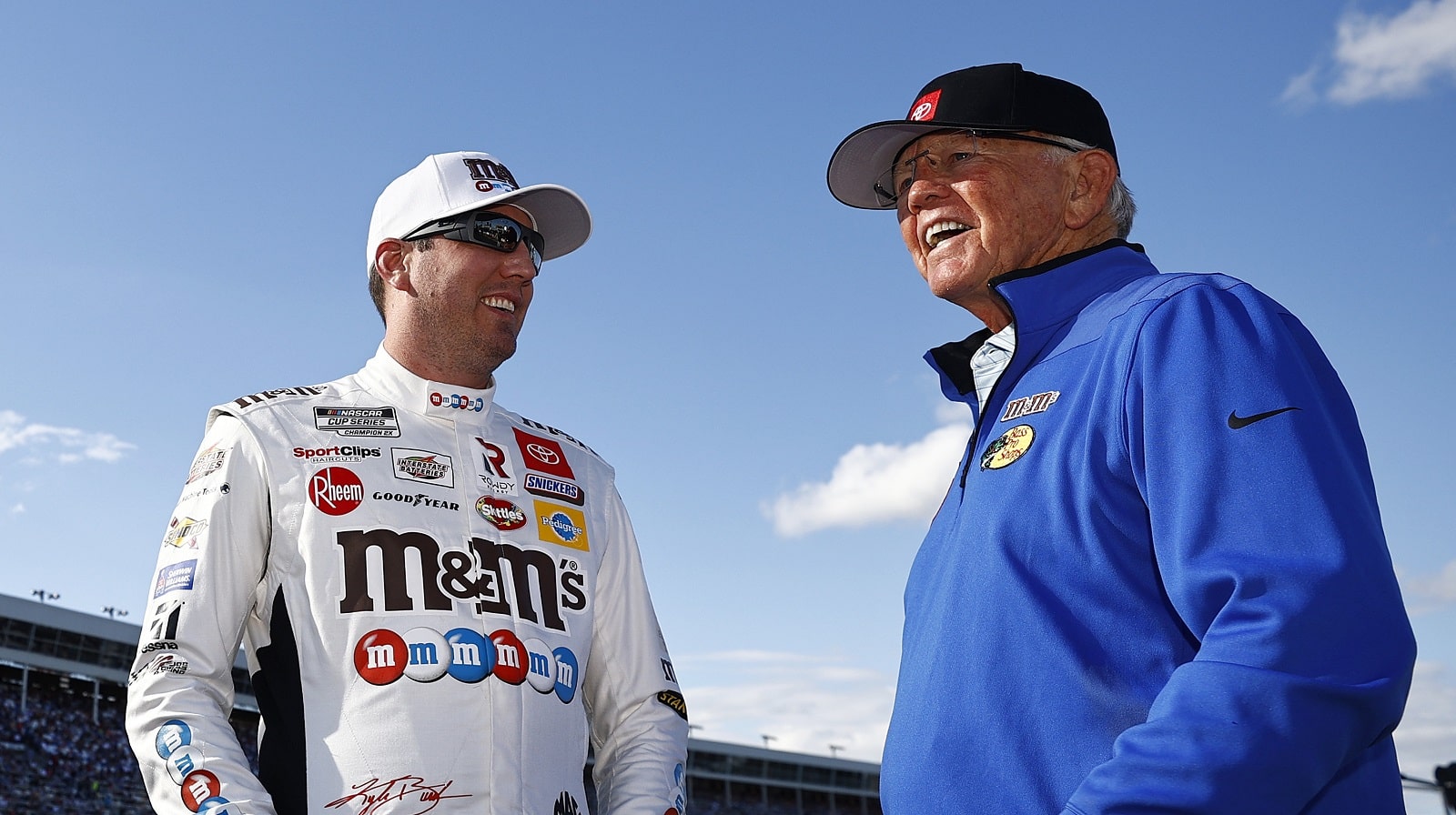 Kyle Busch, driver of the No. 18 Toyota, and team owner Joe Gibbs talk prior to the NASCAR Cup Series Coca-Cola 600 at Charlotte Motor Speedway on May 30, 2021.