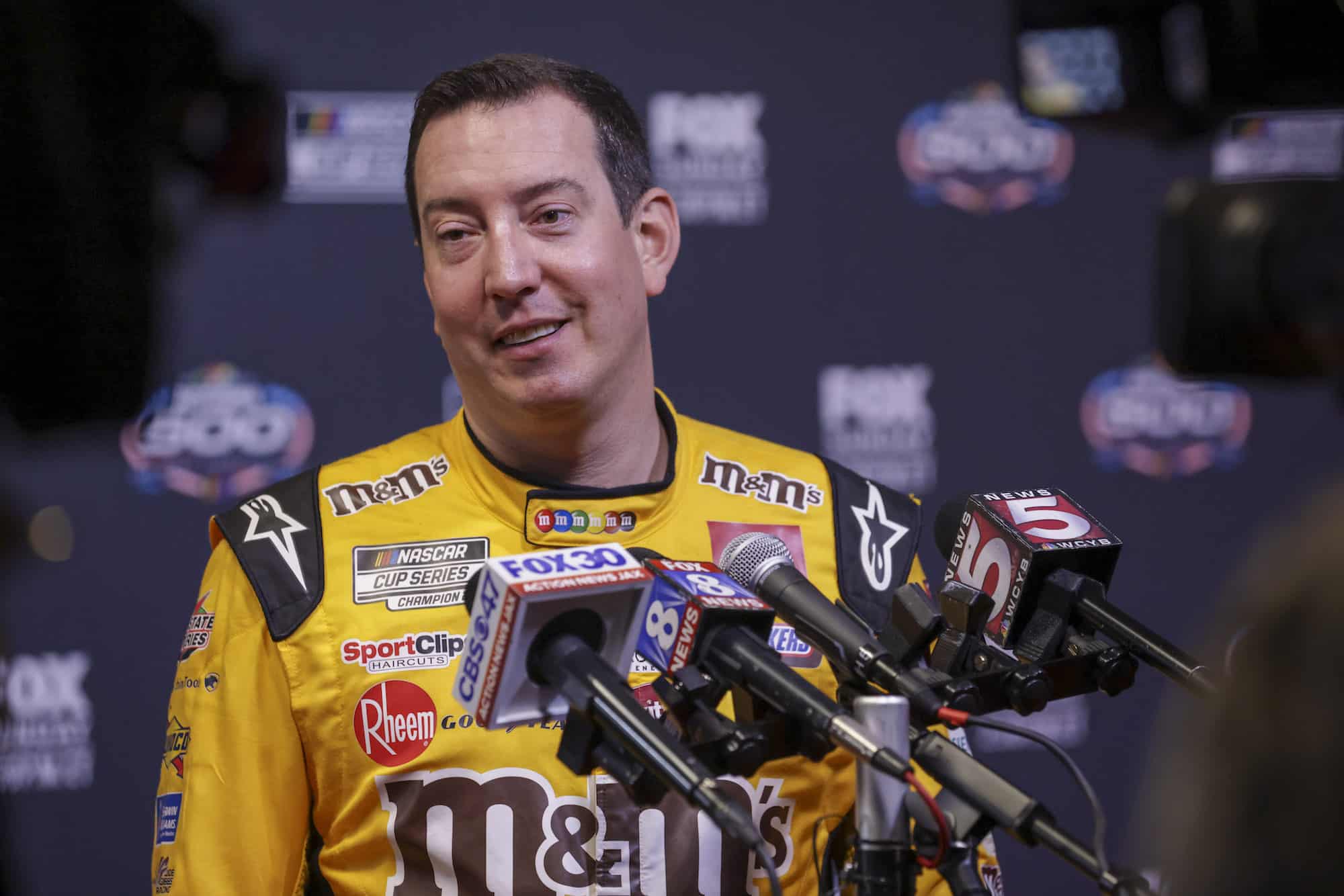 Kyle Busch talks to media