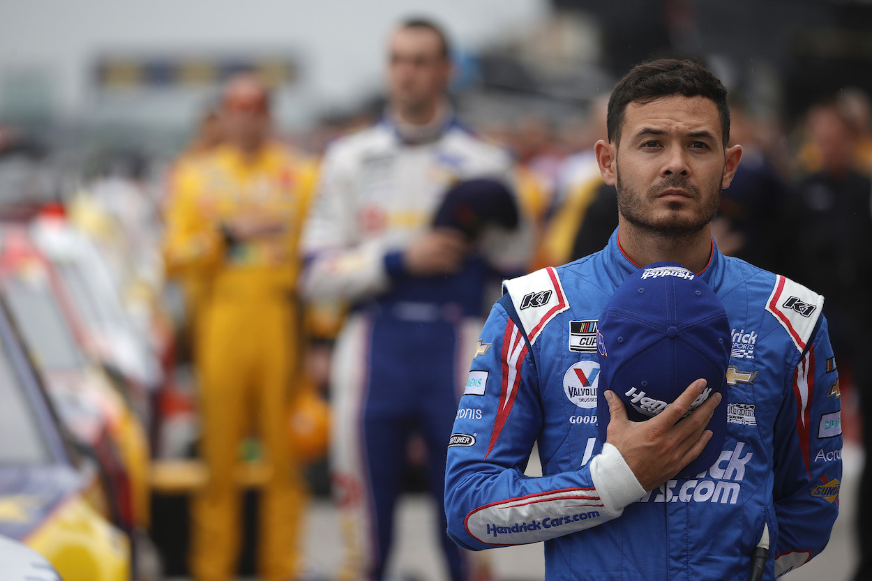 Kyle Larson stands before race
