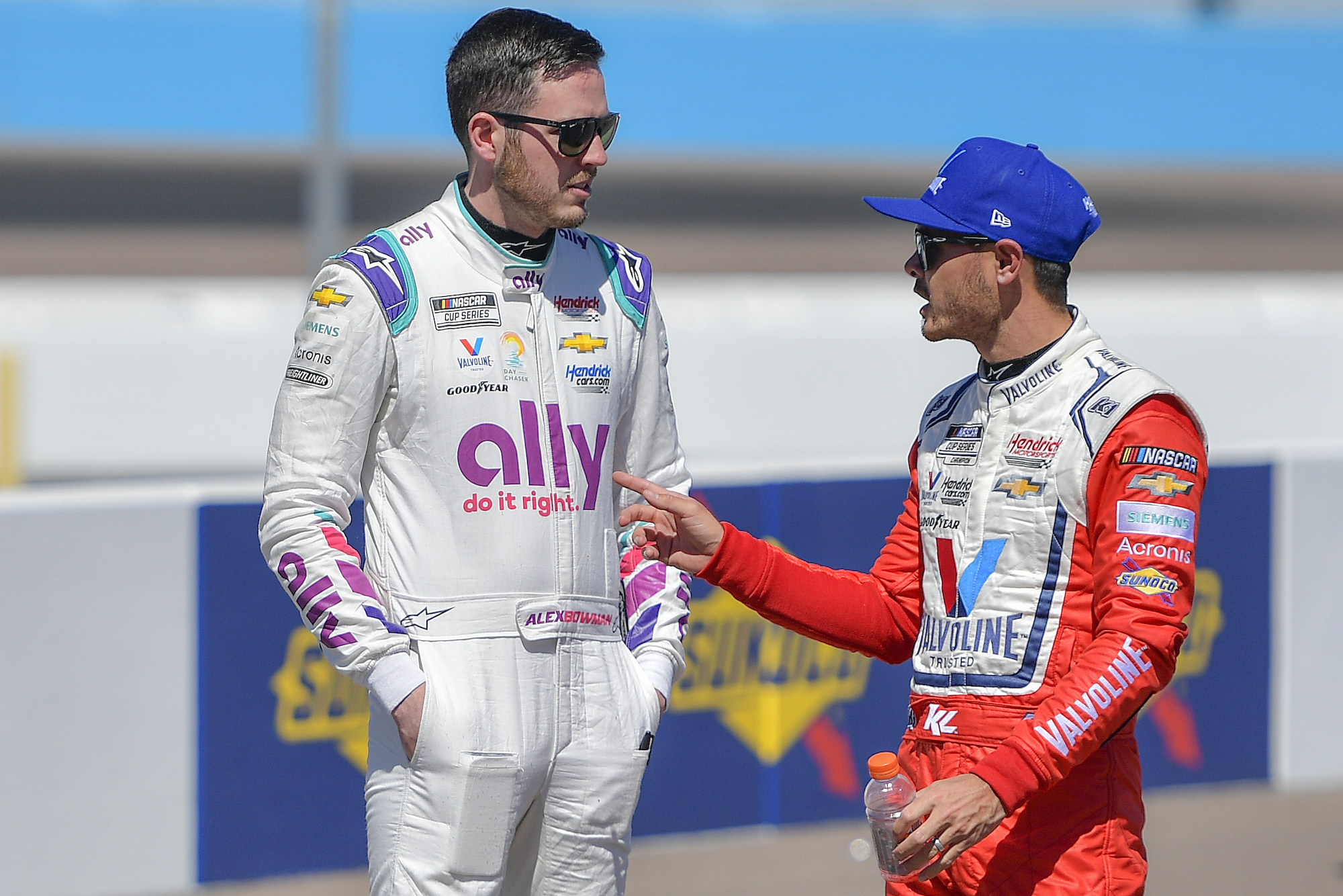 Kyle Larson and Alex Bowman talk on grid