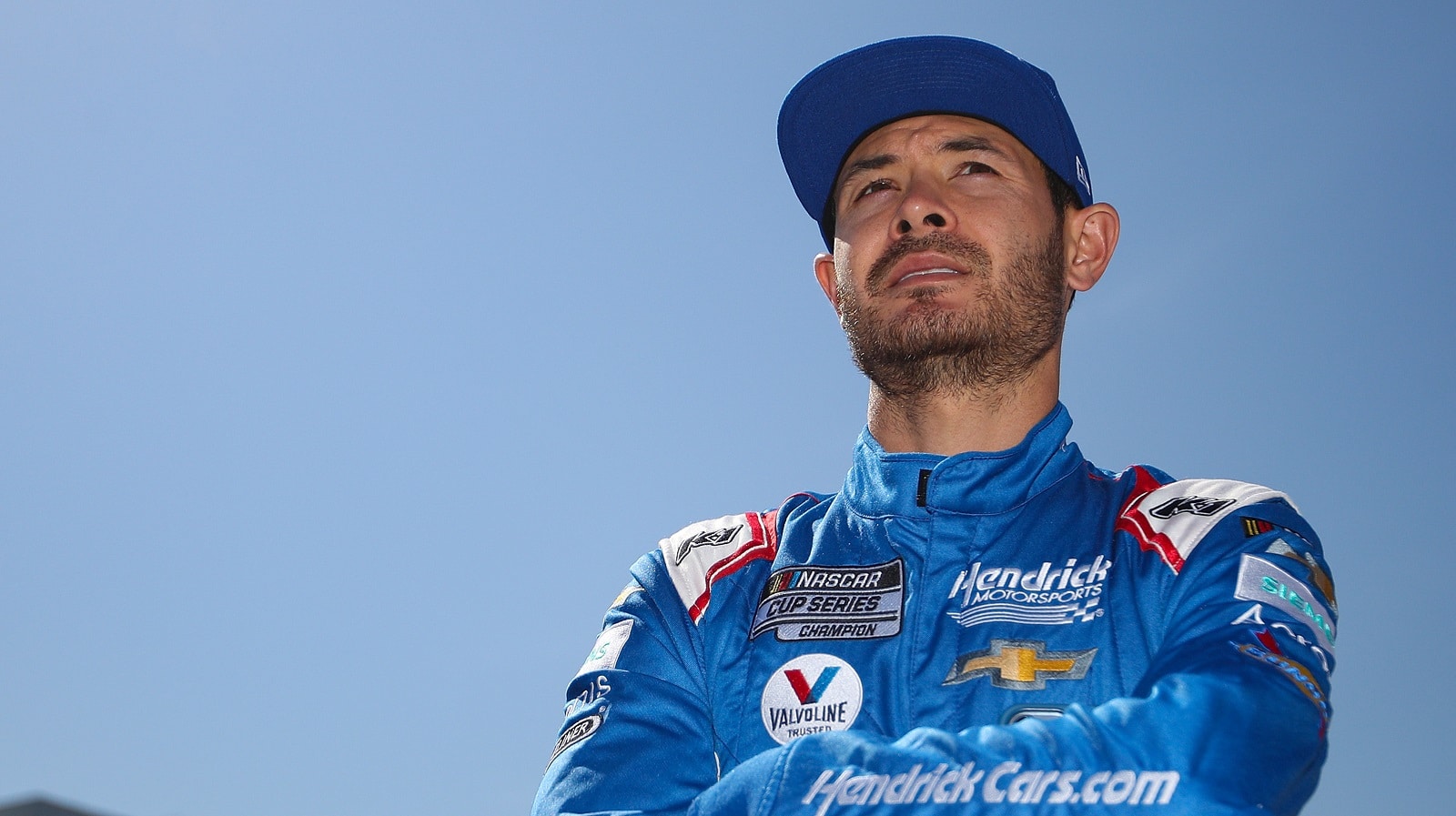 Kyle Larson looks on during practice for the DuraMAX Drydene 400 at Dover Motor Speedway on April 30, 2022. | Sean Gardner/Getty Images