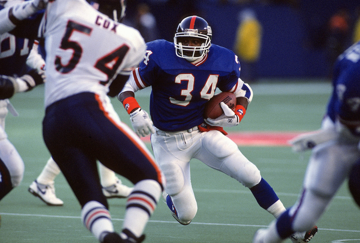 Lewis Tillman of the New York Giants carries the ball against the Chicago Bears during the 1991 NFC Divisional Playoff Game