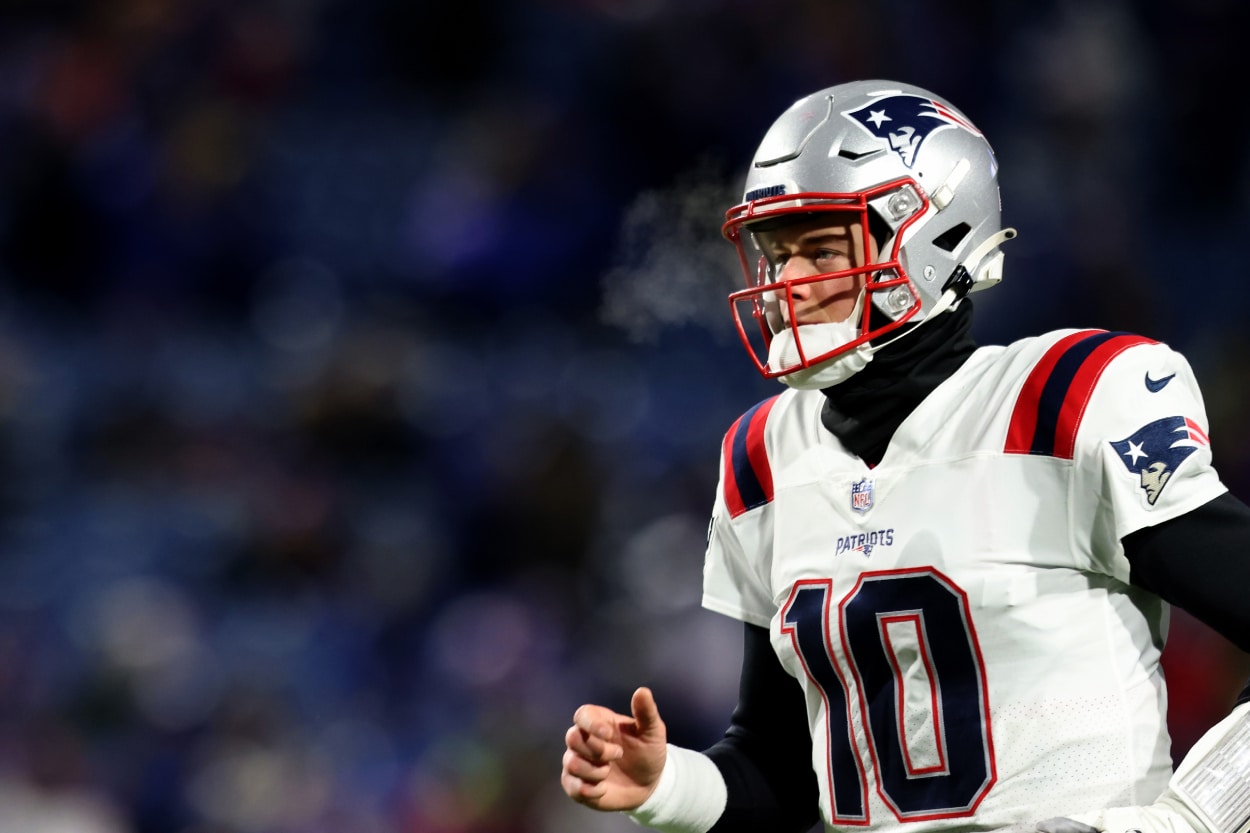 Mac Jones of the New England Patriots warms up prior to a game against the Buffalo Bills.