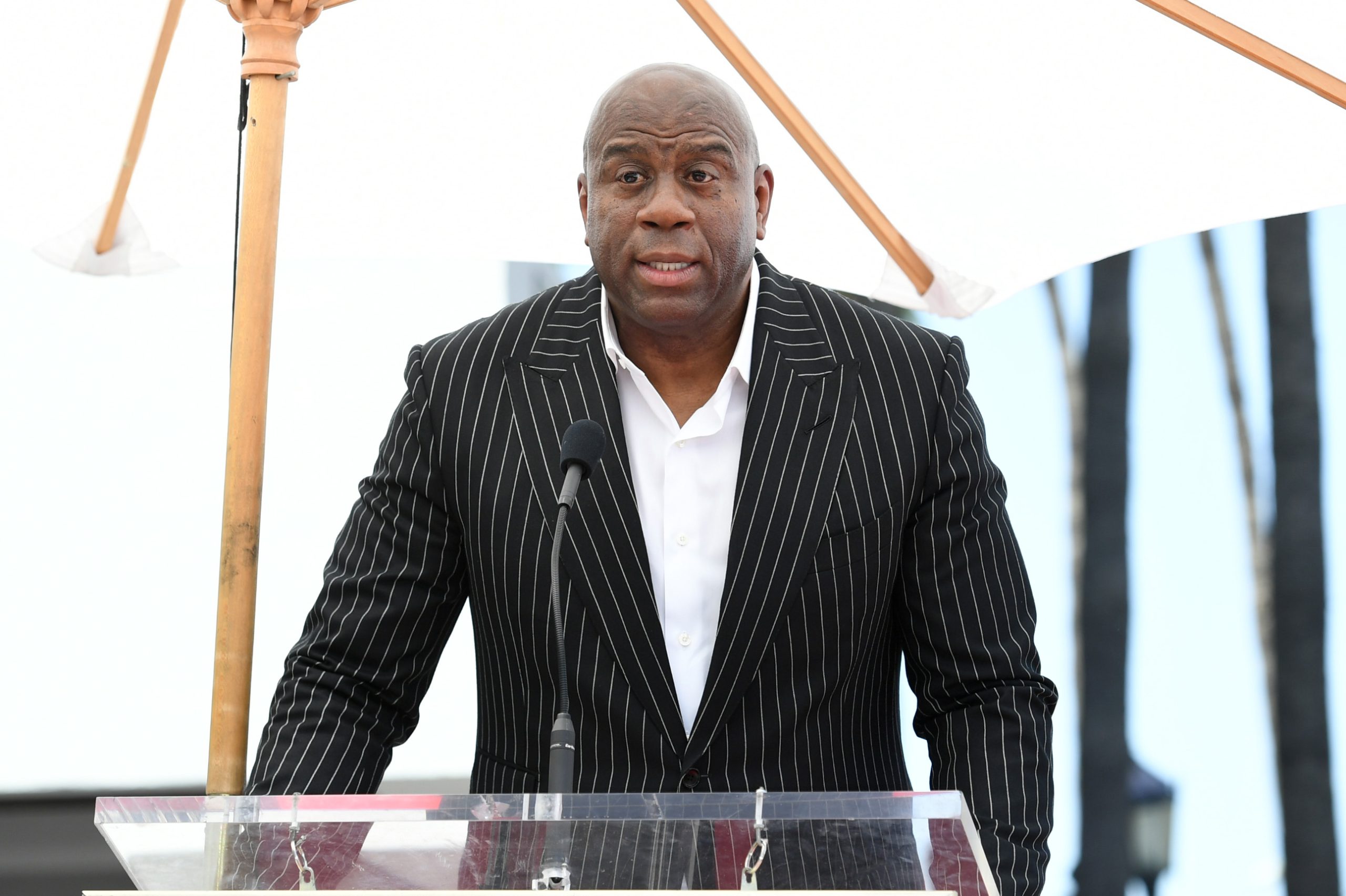 Magic Johnson speaks during a ceremony honoring Judge Greg Mathis​ with a star on the Hollywood Walk of Fame.