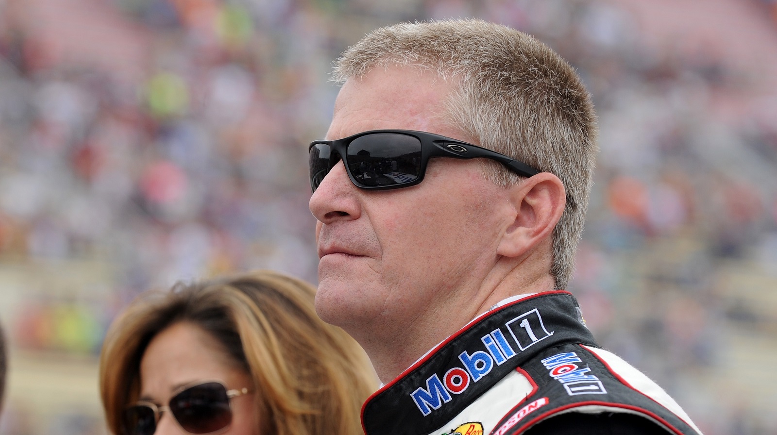 Jeff Burton stands on the grid prior to the NASCAR Sprint Cup Series Pure Michigan 400 at Michigan International Speedway on Aug. 17, 2014.