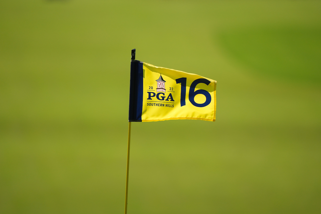 A PGA Championship flag flies during a practice round.