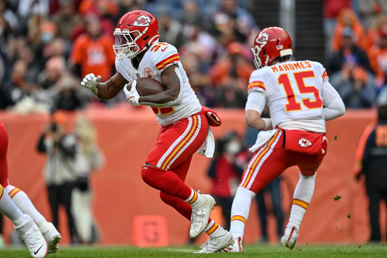 Darrel Williams (L) carries the ball during a Kansas City Chiefs game.