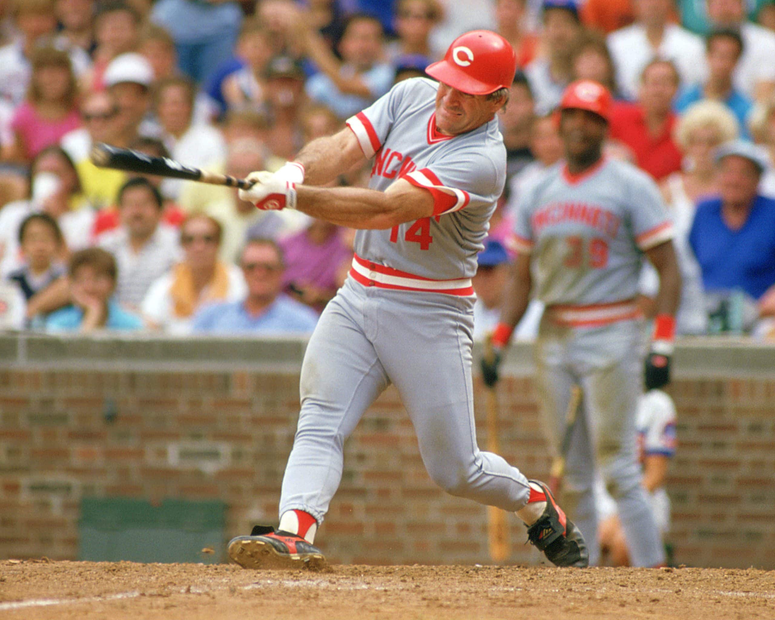 Pete Rose of the Cincinnati Reds bats during an MLB game against the Chicago Cubs.