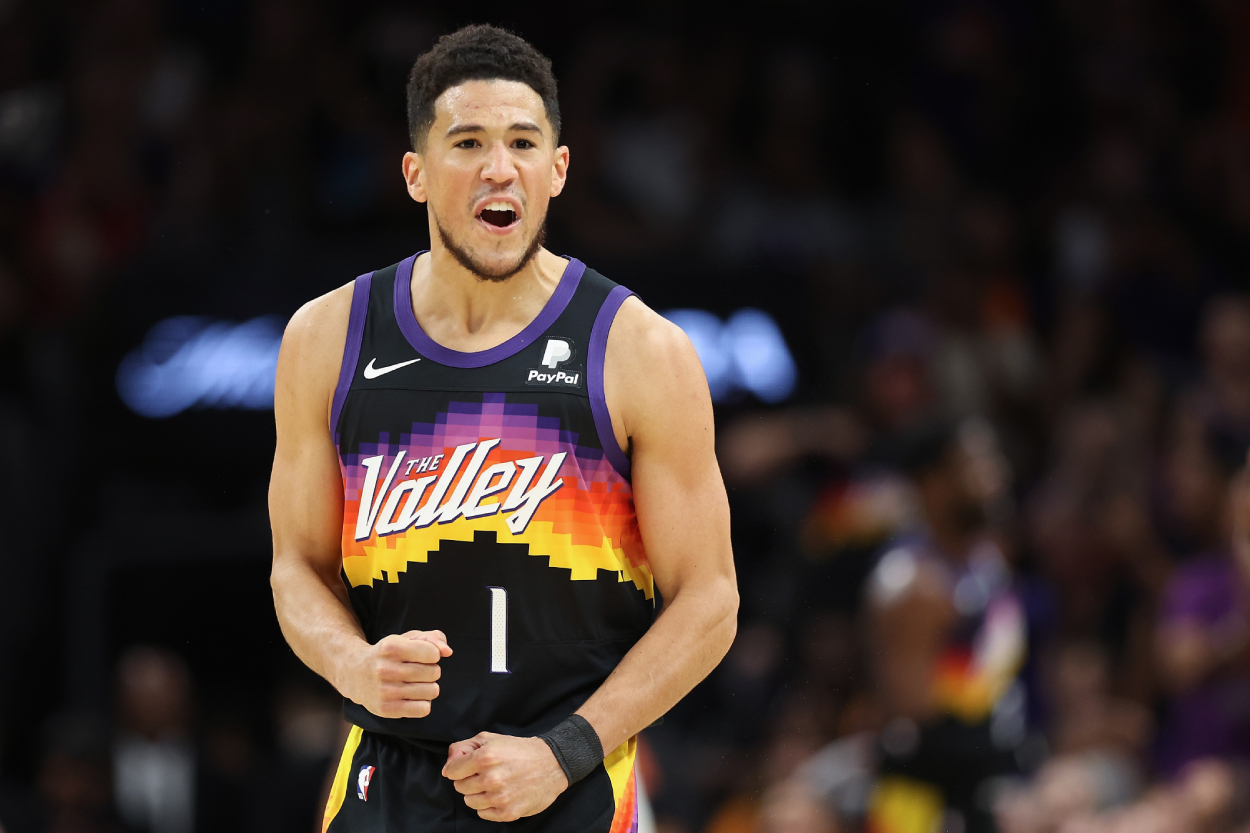 Devin Booker of the Phoenix Suns wearing his Valley jersey during a playoff game against the Dallas Mavericks in 2022.