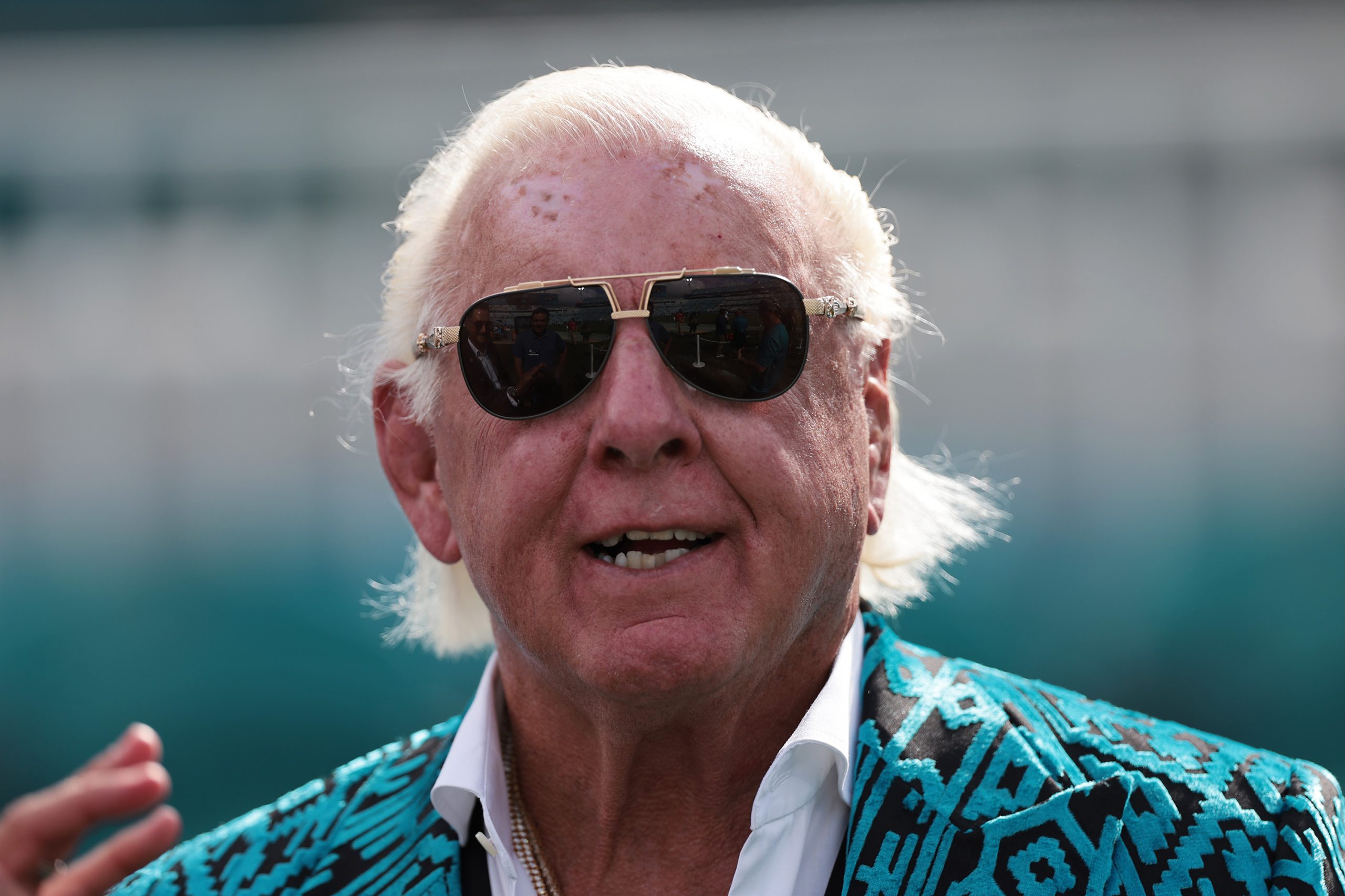 Former professional wrestler Ric Flair on the field before the game between the Jacksonville Jaguars and Houston Texans.