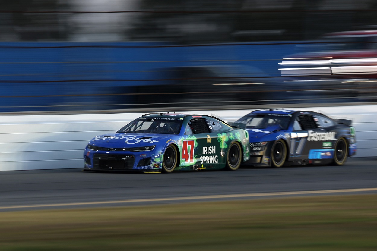 Ricky Stenhouse Jr. and Chris Buescher battle in their NASCAR Next Gen cars