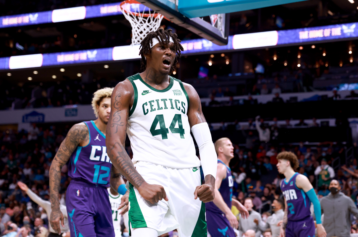 Robert Williams III of the Boston Celtics reacts after dunking against the Charlotte Hornets.