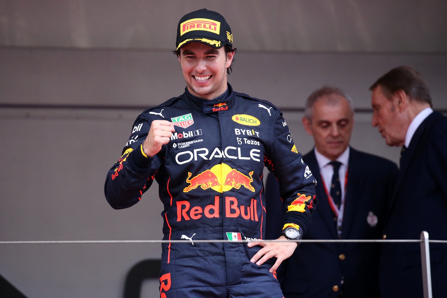 Sergio Perez of Red Bull Racing celebrates on the podium after winning the Formula 1 Grand Prix of Monaco.