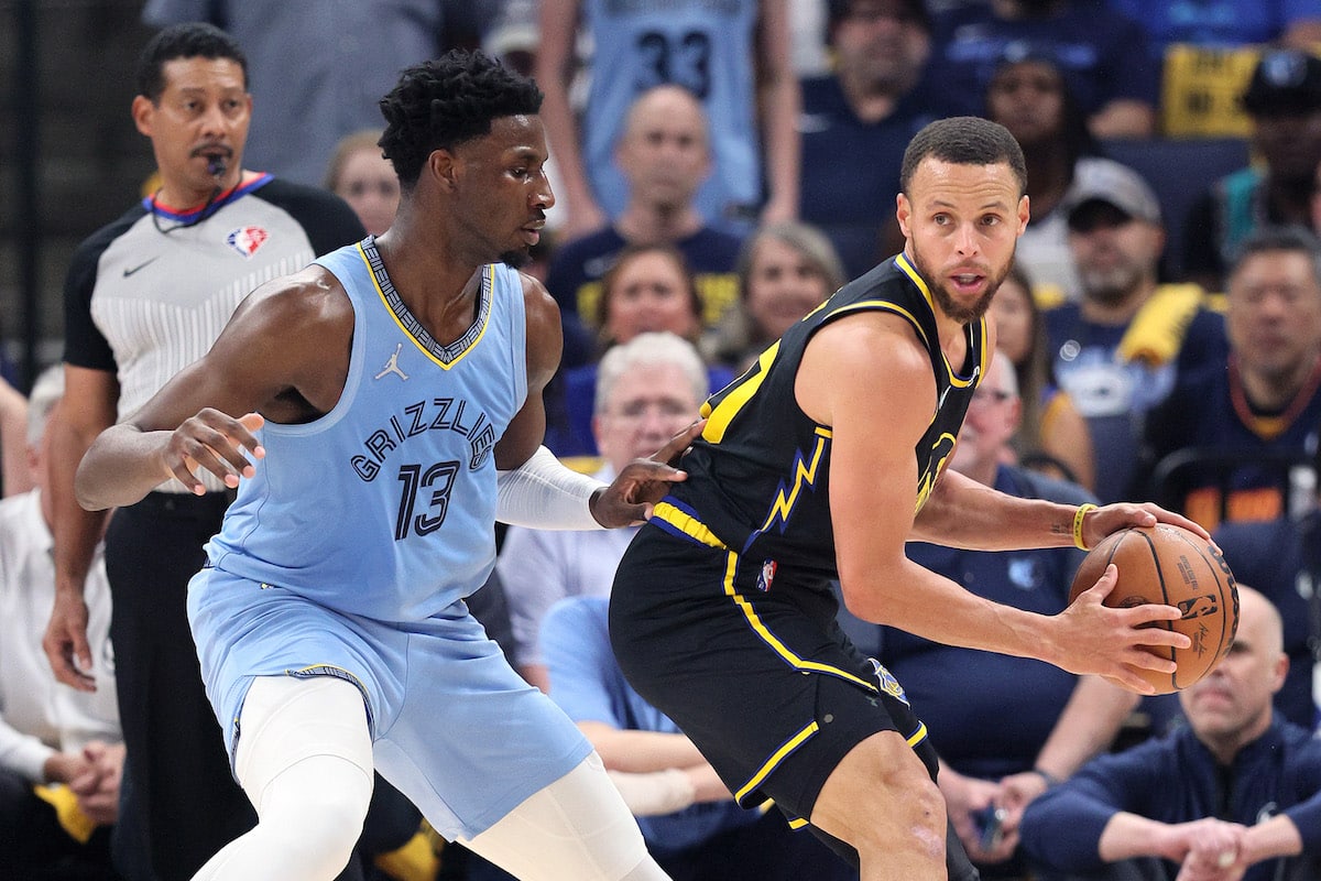 Jaren Jackson Jr. guards Stephen Curry