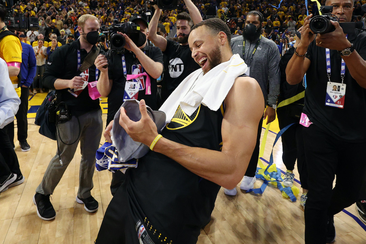 Stephen Curry celebrates after beating the Mavericks.
