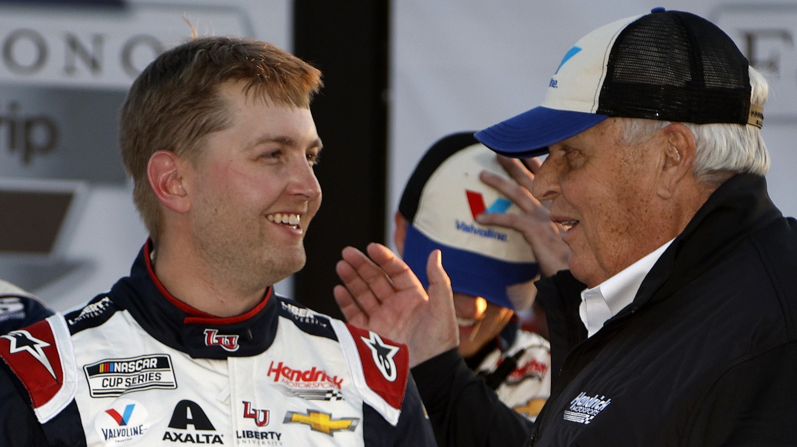 William Byron is congratulated by Hendrick Motorsports owner Rick Hendrick after winning the NASCAR Cup Series Folds of Honor QuikTrip 500 at Atlanta Motor Speedway on March 20, 2022.