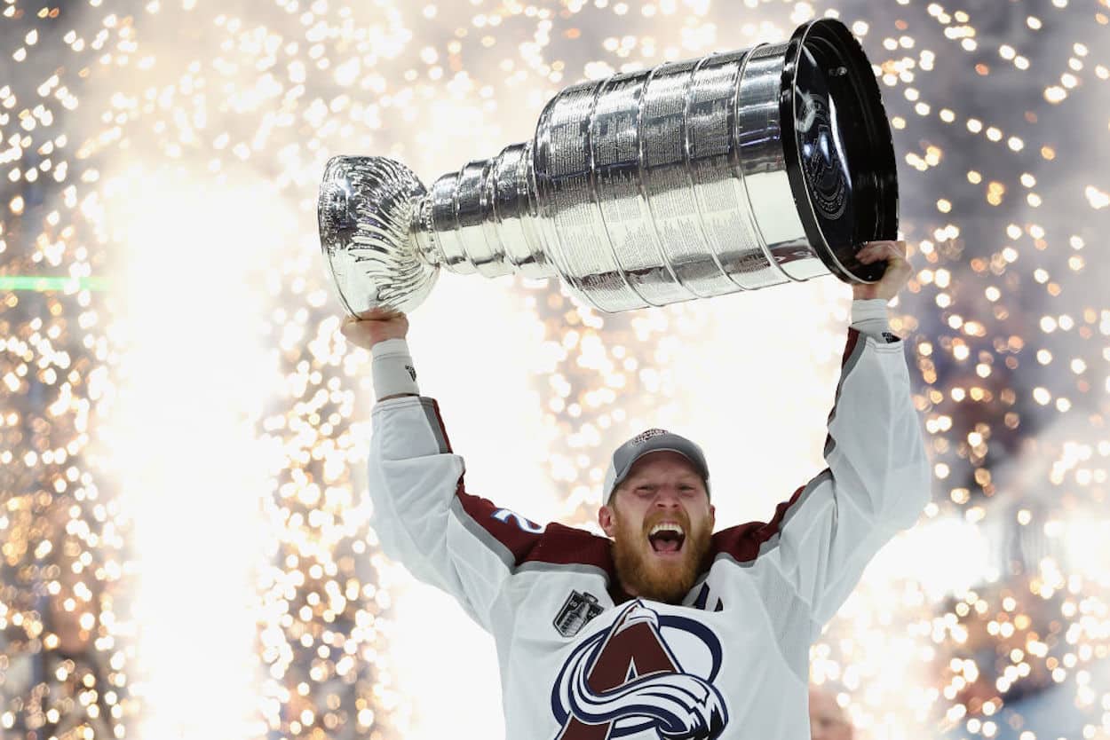 Colorado Avalanche captain Gabriel Landeskog lifts the Stanley Cup.