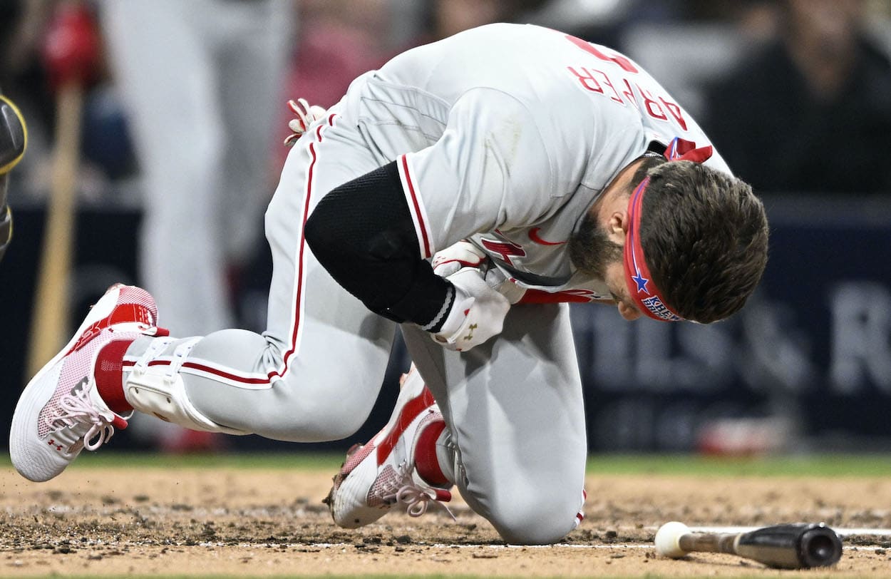 Bryce Harper reacts after getting hit by a pitch.