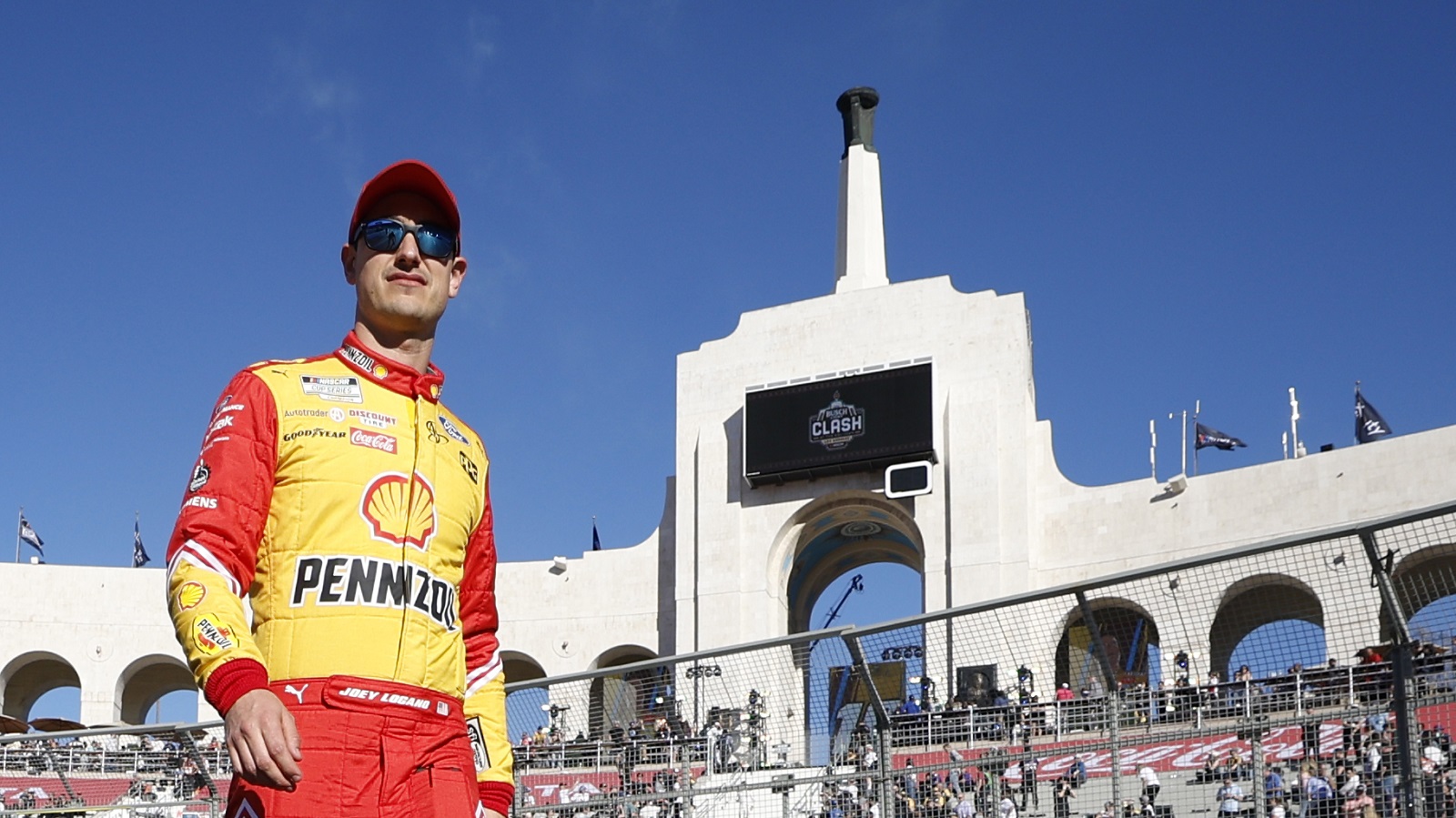 Joey Logano walks the track during driver intros prior to the NASCAR Cup Series Busch Light Clash at the Los Angeles Memorial Coliseum on Feb. 06, 2022.
